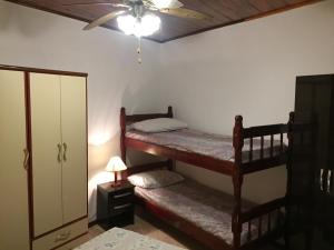 Postel nebo postele na pokoji v ubytování Cabañas Marcelo