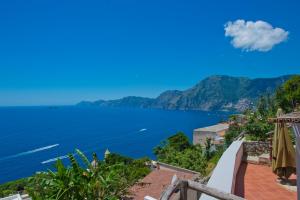 a view of the ocean from a house at Mon Amour Praiano in Praiano +8 photos