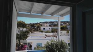 Afbeelding uit fotogalerij van Angelos Rooms in Iraklia +65 foto's