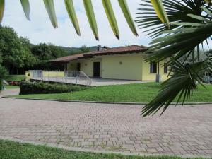 a house with a walkway in front of it at Villa Althea in Ronago