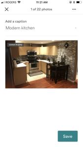 a kitchen with a table and a dining room at Prime Location - Warm and Cozy Place in Victoria
