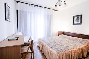 Postel nebo postele na pokoji v ubytování Luka