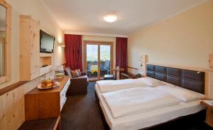 Postel nebo postele na pokoji v ubytování Hotel Schennerhof