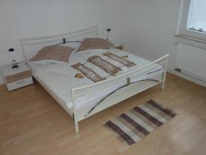 Postel nebo postele na pokoji v ubytování Ferienwohnung Landwehr