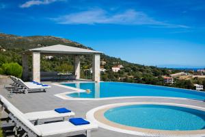 The swimming pool at or close to Kaminia Blu