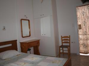 Postel nebo postele na pokoji v ubytování Batika Rooms