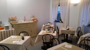 Restoranas ar kita vieta pavalgyti apgyvendinimo įstaigoje Hotel La Piccola Stazione
