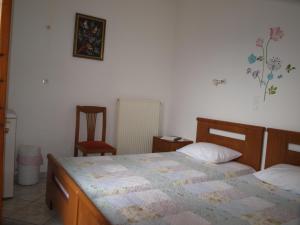 Postel nebo postele na pokoji v ubytování Batika Rooms