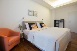 Posteľ alebo postele v izbe v ubytovaní Apartments City Wellness Center + 37 fotografií