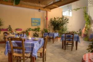 Restoran või mõni muu söögikoht majutusasutuses Hotel Mochlos