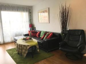 Posezení v ubytování Apartment familiar