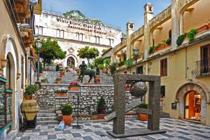 a view of a stone stairway in a city at Casa Martina in Giardini Naxos