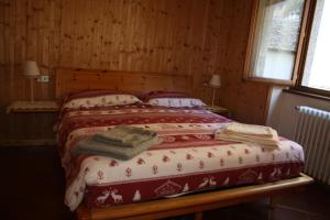 Ein Bett oder Betten in einem Zimmer der Unterkunft Casa Splüga