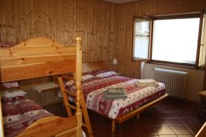 Posteľ alebo postele v izbe v ubytovaní Casa Splüga