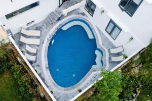 an overhead view of a swimming pool in a building at Hoi An Dream City Hotel in Hoi An