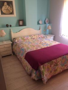 Posteľ alebo postele v izbe v ubytovaní Apartamento Cristina 8