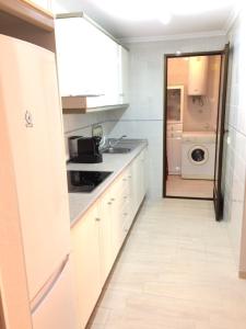Kuchyňa alebo kuchynka v ubytovaní Apartamento Cristina 8