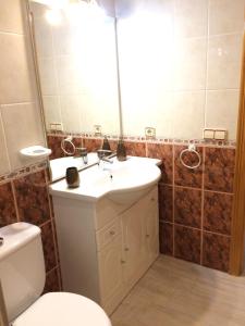 Kúpeľňa v ubytovaní Apartamento Cristina 8