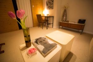 Krevet ili kreveti u jedinici u okviru objekta A Place Antwerp - Boutique Suites & Flats - Vrijdagmarkt 1