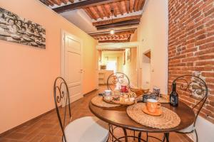 Fotografie z fotogalerie ubytování Micheli Suite Anfiteatro Square v destinaci Lucca