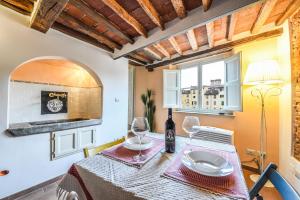 Fotografie z fotogalerie ubytování Micheli Suite Anfiteatro Square v destinaci Lucca