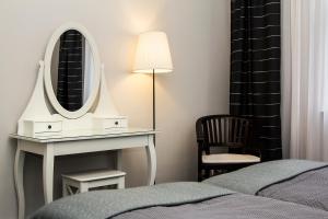 Postel nebo postele na pokoji v ubytování Apartamenty Duo