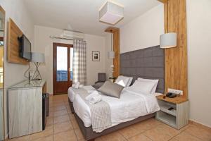 Ліжко або ліжка в номері Arion Hotel