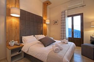 Ліжко або ліжка в номері Arion Hotel