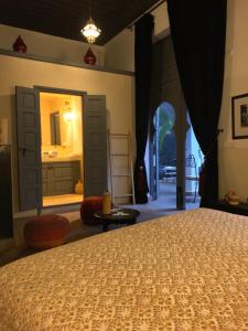 Postel nebo postele na pokoji v ubytování Riad 64 Maison D'hôtes & Spa