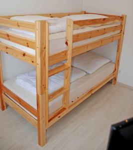 Ein Bett oder Betten in einem Zimmer der Unterkunft NEU - Ferienhaus mit Sonnenterrasse
