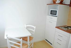 Küche/Küchenzeile in der Unterkunft NEU - Ferienhaus mit Sonnenterrasse