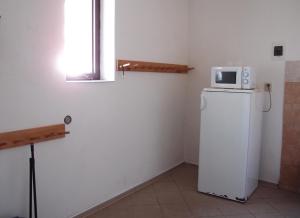 Kuchyň nebo kuchyňský kout v ubytování Penzion, apartmany Florian