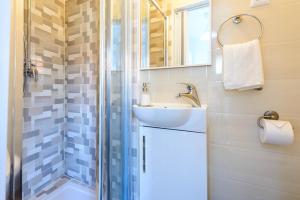 Kúpeľňa v ubytovaní Leona Apartments + 28 fotografií