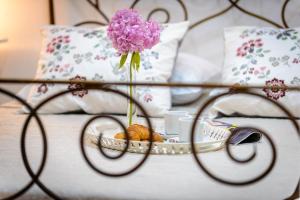 Posteľ alebo postele v izbe v ubytovaní Leona Apartments