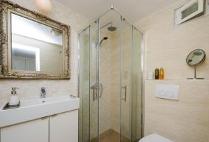 Kúpeľňa v ubytovaní Leona Apartments