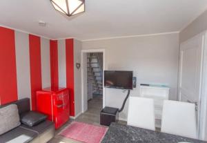 Μια τηλεόραση ή/και κέντρο ψυχαγωγίας στο Ferienhaus am Museumshof