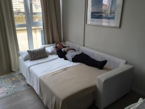 A bed or beds in a room at Beach & Center Premiun