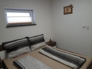 Voodi või voodid majutusasutuse Ferienwohnung Colleen toas