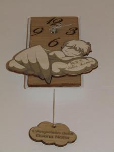 a wooden sign hanging on a wall at Dolce Dormire in Foggia