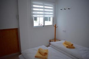 Posteľ alebo postele v izbe v ubytovaní Casa Al Sur Apartments