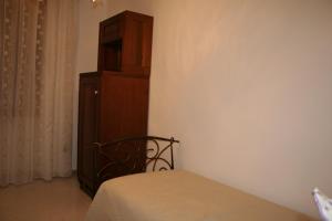 Un pat sau paturi într-o cameră la Costa d'Amalfi e Cilento