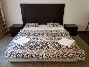 Posteľ alebo postele v izbe v ubytovaní Imperial Suites