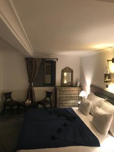 Postel nebo postele na pokoji v ubytování Riad 64 Maison D'hôtes & Spa