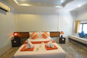 Postel nebo postele na pokoji v ubytování Simple Life Resort Koh Tao