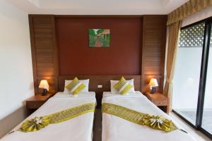Letto o letti in una camera di Samui Honey Suite