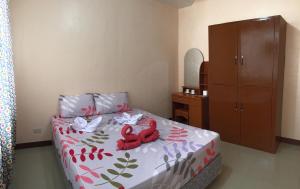 Postel nebo postele na pokoji v ubytování Brielles Travellers Inn