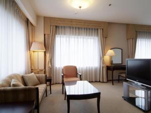 TV a/nebo společenská místnost v ubytování Hotel Okura Niigata
