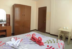 Postel nebo postele na pokoji v ubytování Brielles Travellers Inn