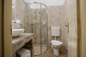 Koupelna v ubytování Hotel Carpe Diem