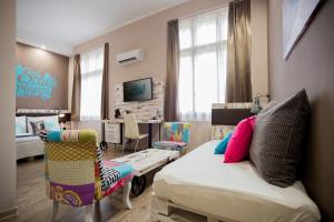 TV a/nebo společenská místnost v ubytování Hotel Carpe Diem